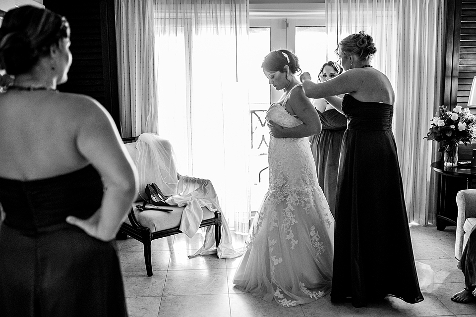 bride stepping into the gown at the vero beach hotel and spa florida
