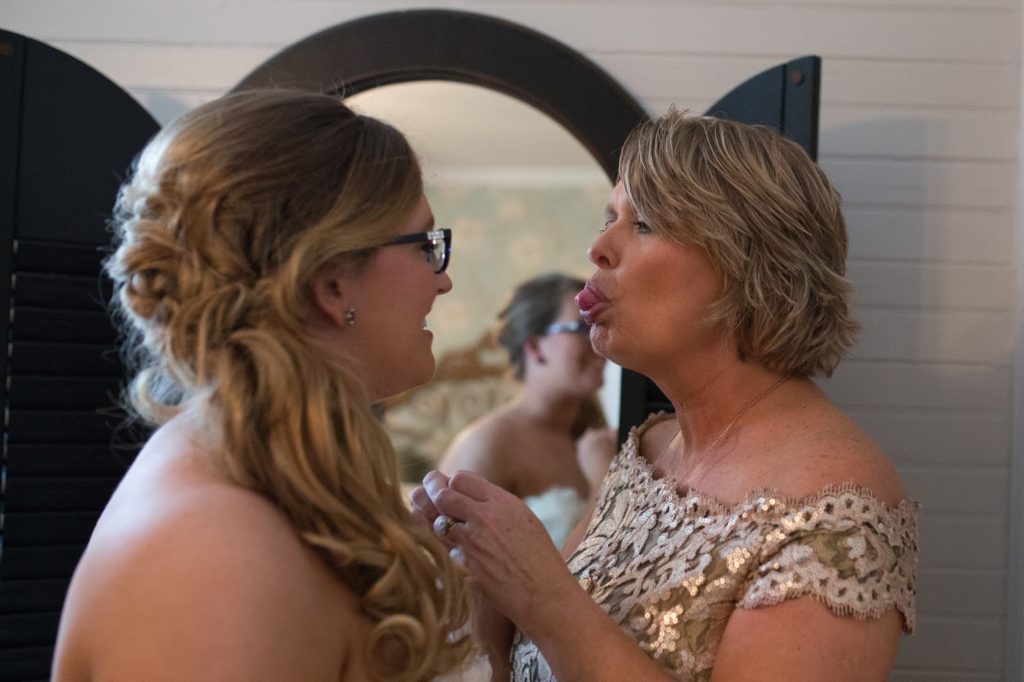 mom being funny with her daughter 