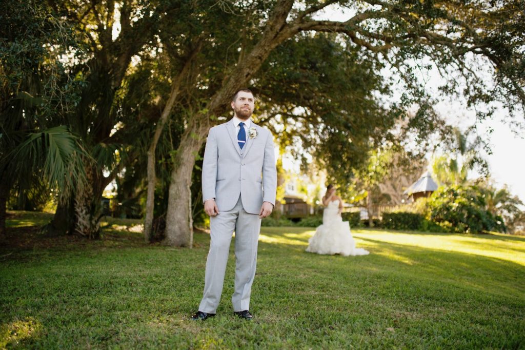 groom waiting to see his bride for the first time