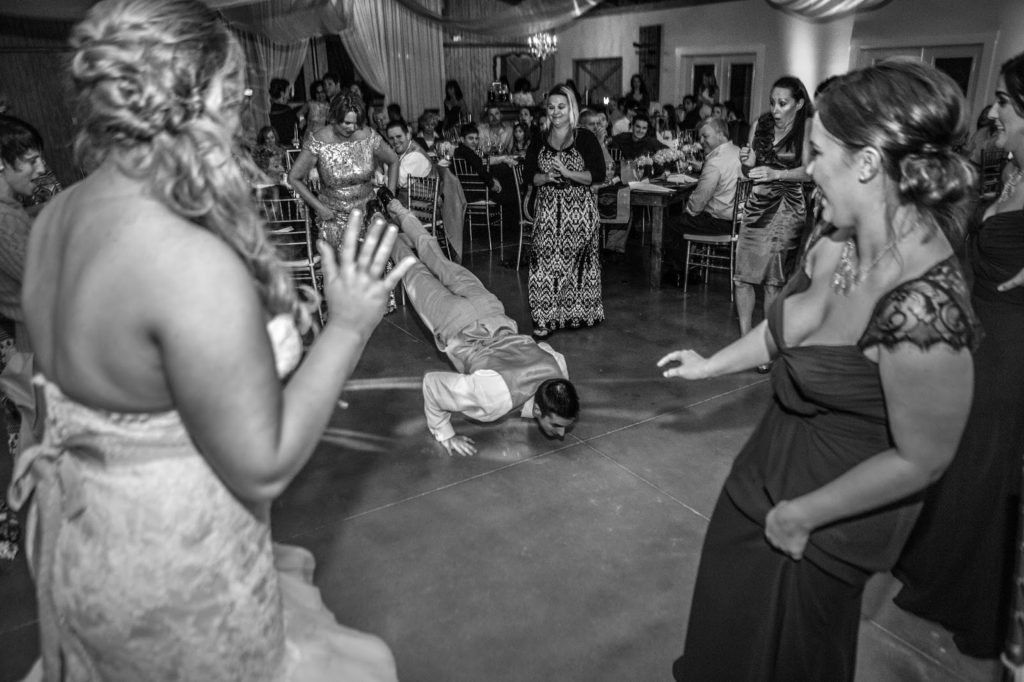 crazy groomsman doing the worm 
