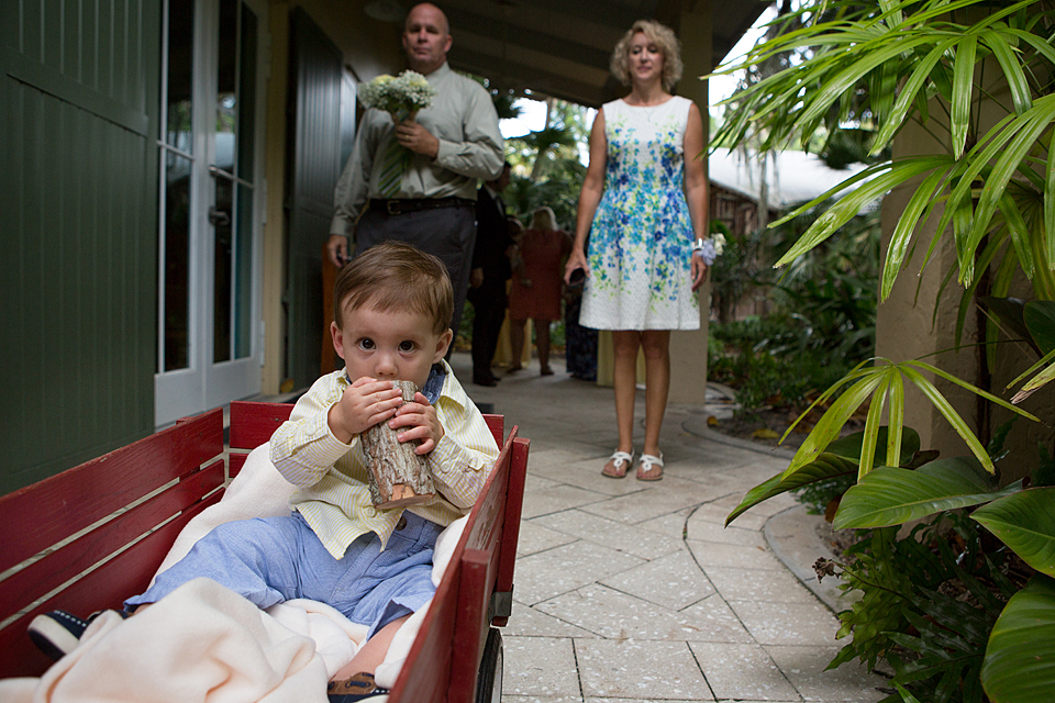 ring bearer in a wagon at mckee gardens south florida