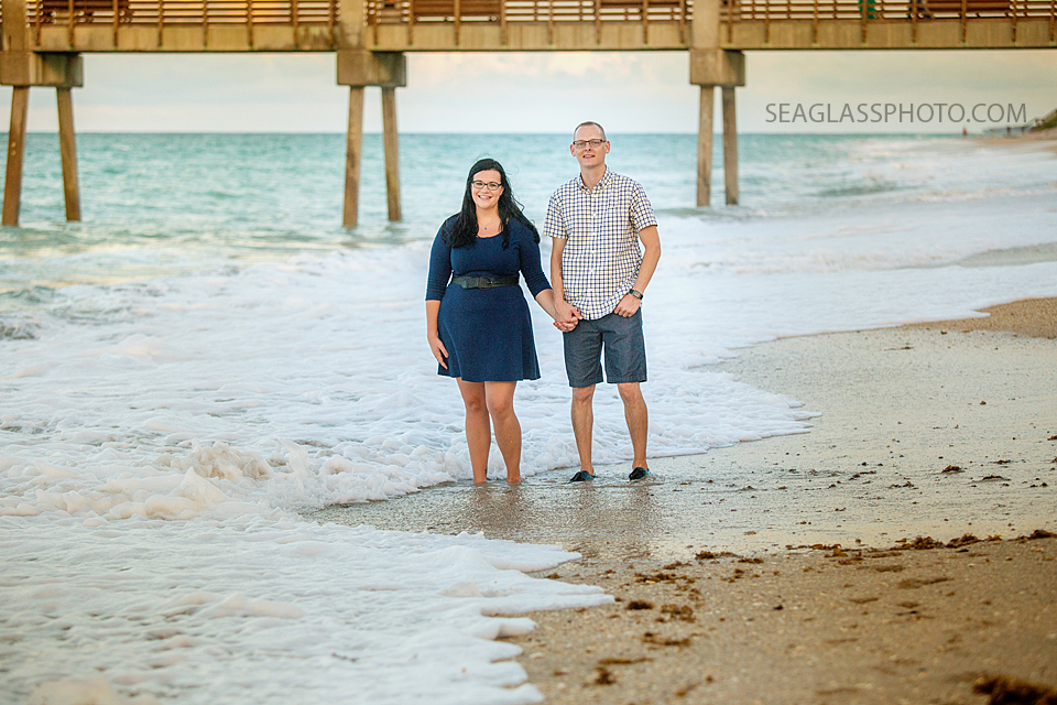 sweet couple waering navy at the vero beach florida pier 