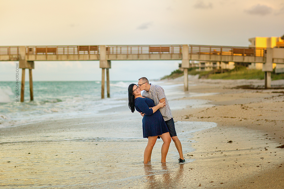 sweet couple enagement photo at the pier in vero beach florida