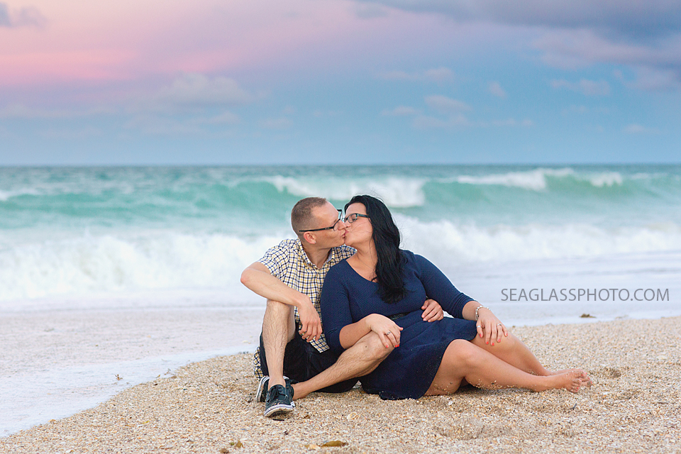 couple engagement at sunset in vero beach florida on the sand