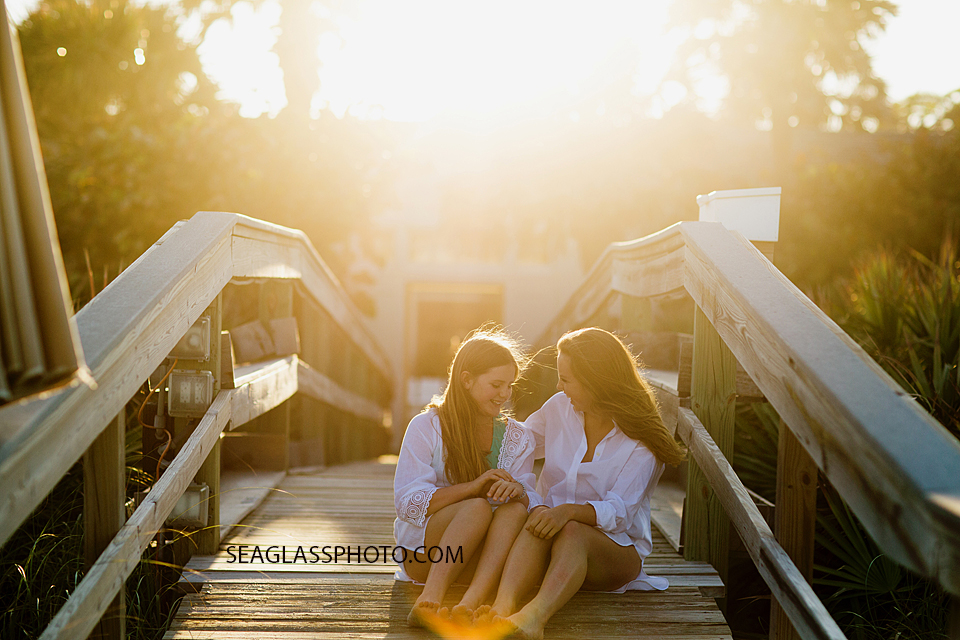 sisters laughing together in the sunlight Windsor Vero Beach Flordida Family Photography