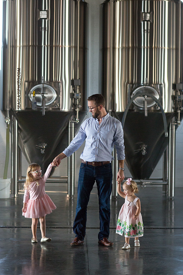Daddy and daughters Family of four at Walking Tree Brewery in Vero Beach Florida