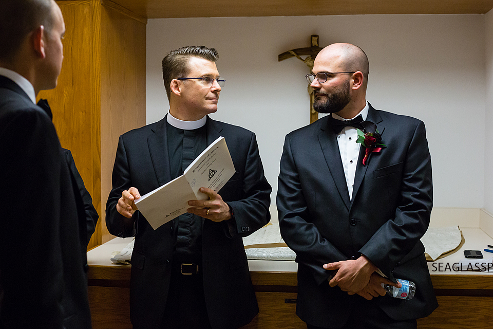groom talking to priest before ceremony Vero Beach Florida Wedding