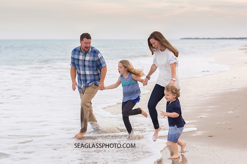 family playing at the beach n Vero Beach Florida Family Photographer