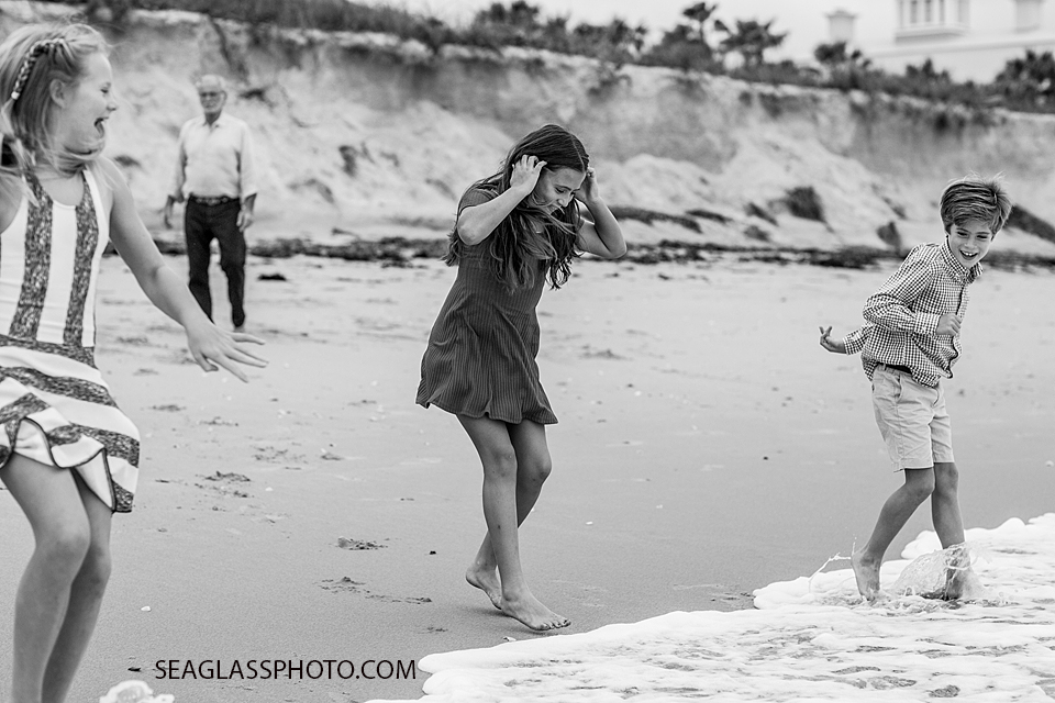 Kids playing along the seashore at Windsor Beach Club in Vero Beach Florida