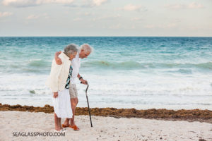 Elderly couple walking on the beach at sunset 23 and me Vero Beach Florida family photography _020_Family_Vero_Beach_Photographer_