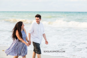 young couple walking down the beach 23 and me Vero Beach Florida family photography _020_Family_Vero_Beach_Photographer_