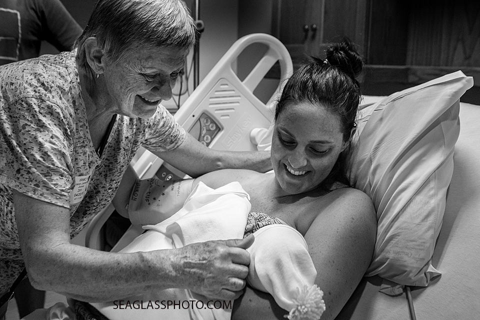 Grandma meeting her new grand daughter for the first time in the Indian River Hospital in Vero Beach Florida