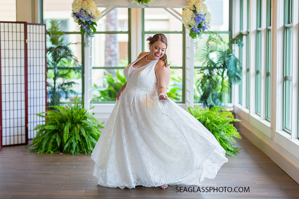 Bride dances in front of the alter after her wedding in Vero Beach Florida