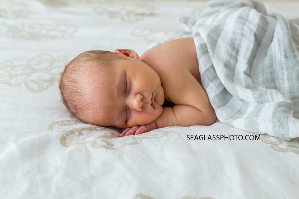 Close up of new born baby boy sleeping during new born session in Vero Beach Florida