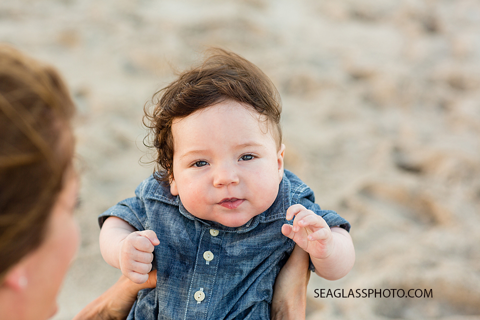 Close up of youngest son on the beach during family photo shoot in Vero Beach Florida