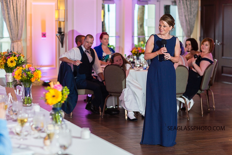 the maid of honor gives a speech at the reception at the Kimpton Vero Beach hotel and spa in Vero Beach Florida