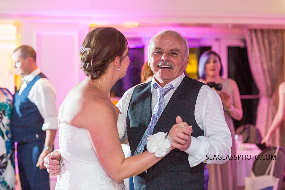 Bride dances with her father at the reception at the Kimpton Vero Beach hotel and spa in Vero Beach Florida
