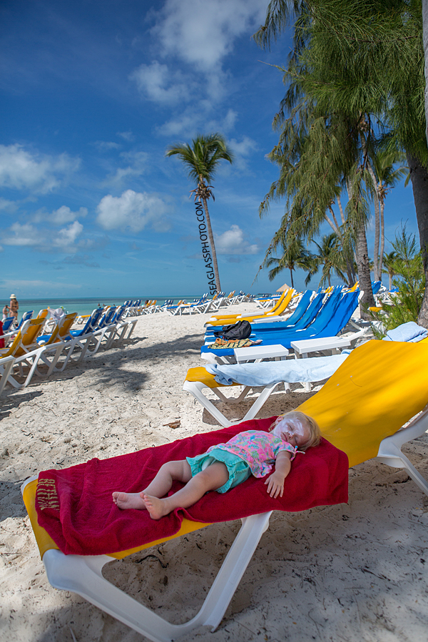 Little girl passes out from a long day of fun in the sun in the bahama's Photographed by a Vero Beach Florida Photographer