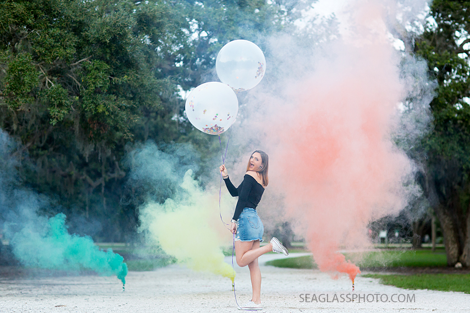 Celebrating her birthday with confetti balloons and smoke bombs in Vero Beach Florida