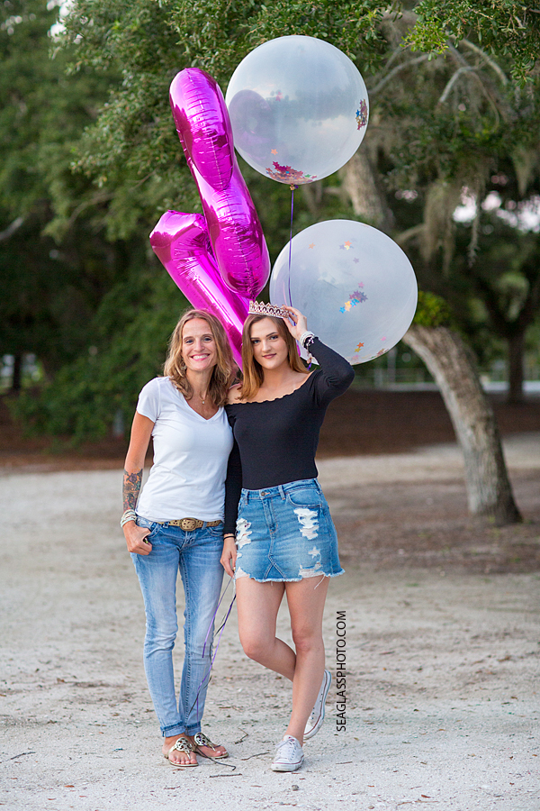 Young lady poses with her mom during her senior/ birthday shoot in Vero Beach Florida