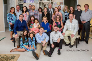Family gather around for a photo during a 90th birthday celebration in Vero Beach Florida