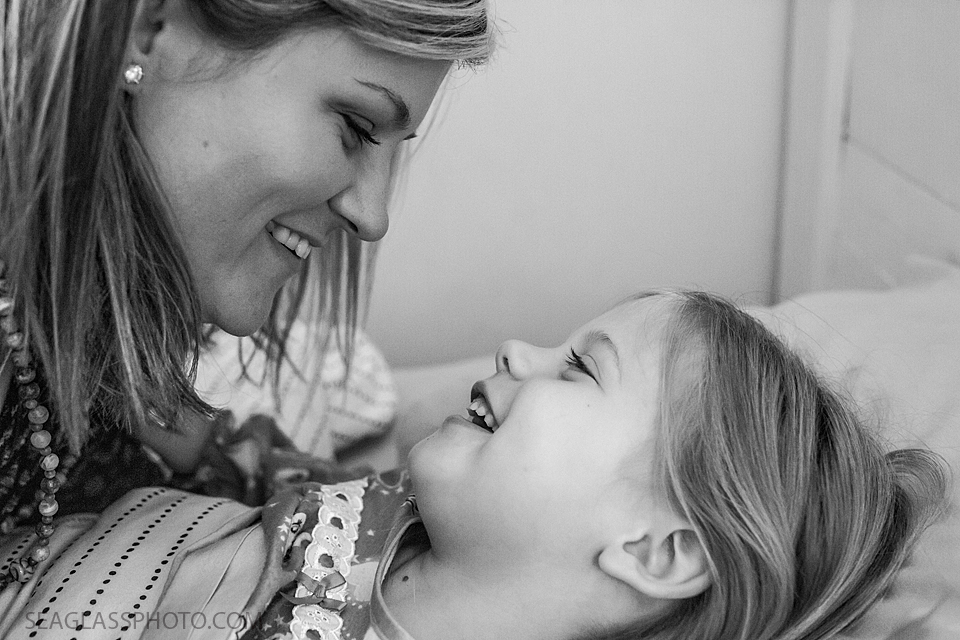 Close up Black and white photo of daughter and mother during a home photo shoot in Vero Beach Florida
