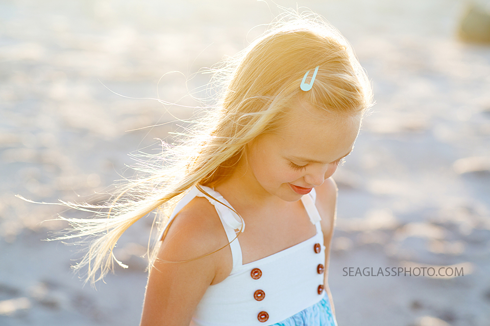 Close up of little girl on the beach during family photos in Vero Beach Florida