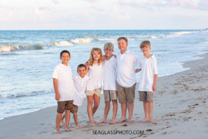 All the Grandkids gather for a picture on the beach during family photo shoot in Vero Beach Florida