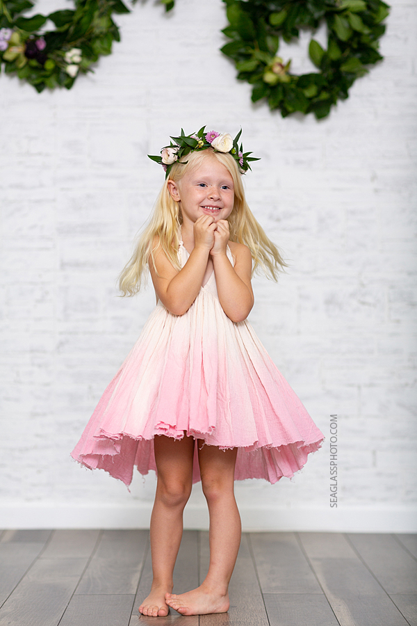 Little girl twirls during mom and daughter photo shoot in Vero Beach Florida