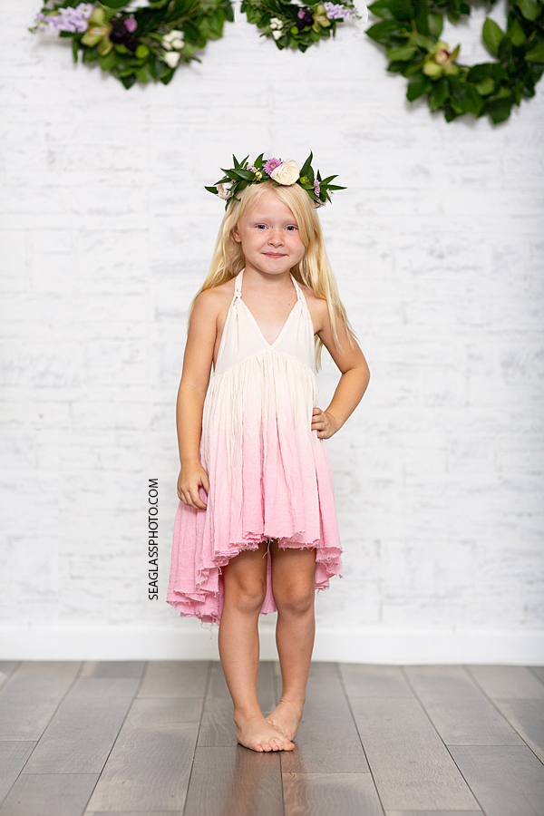 Little girl poses during mom and daughter photo shoot in Vero Beach Florida