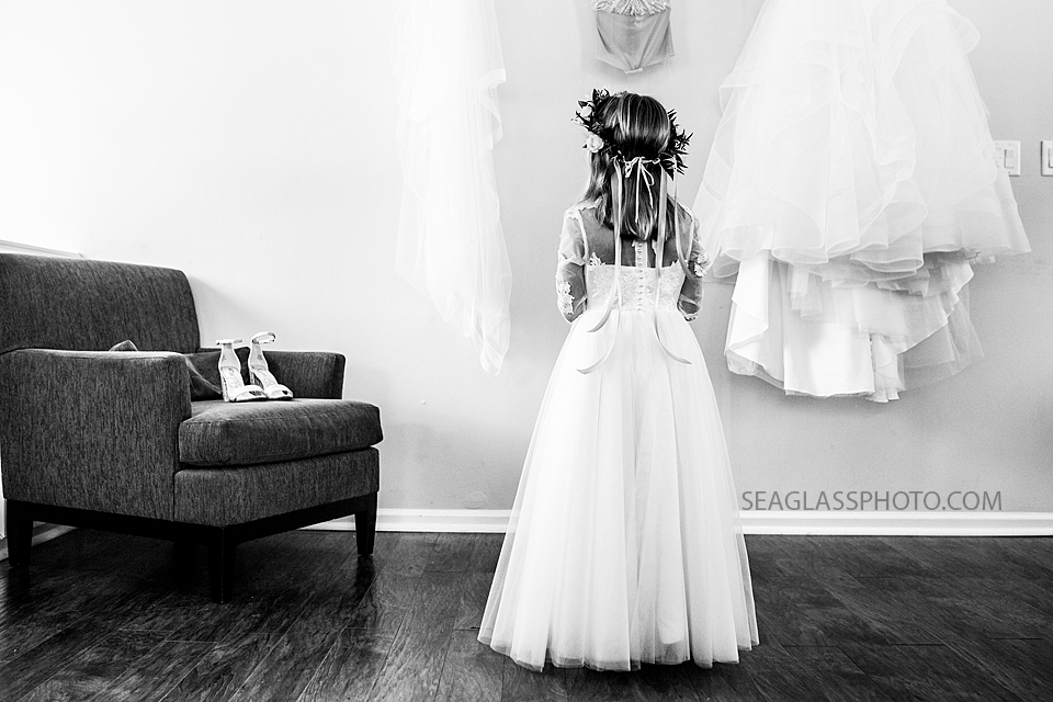 Black and white photo of a flower girl before the wedding photographed by a Vero Beach Photographer