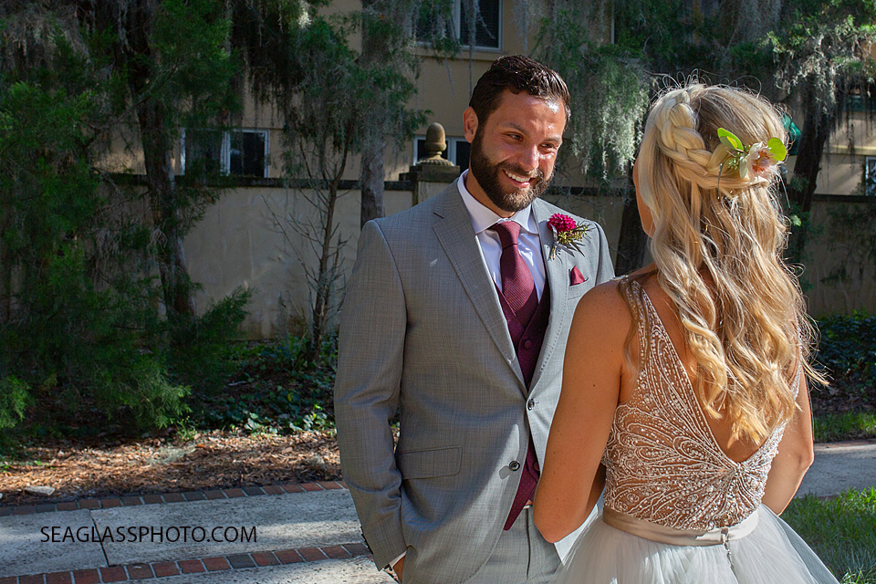 Close up photo of the Groom seeing his bride for the first time on their wedding day photographed by a Vero Beach Photographer
