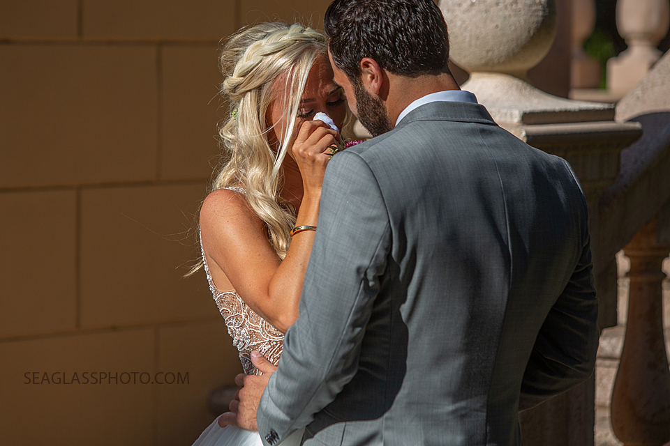 Close up of the bride crying happy tears while seeing her Groom to be before the wedding photographed by a Vero Beach Photographer