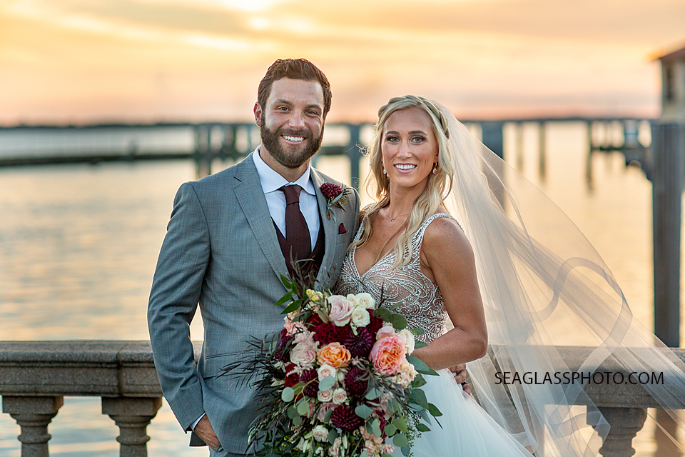 Husband and Wife smile photographed by a Vero Beach Photographer