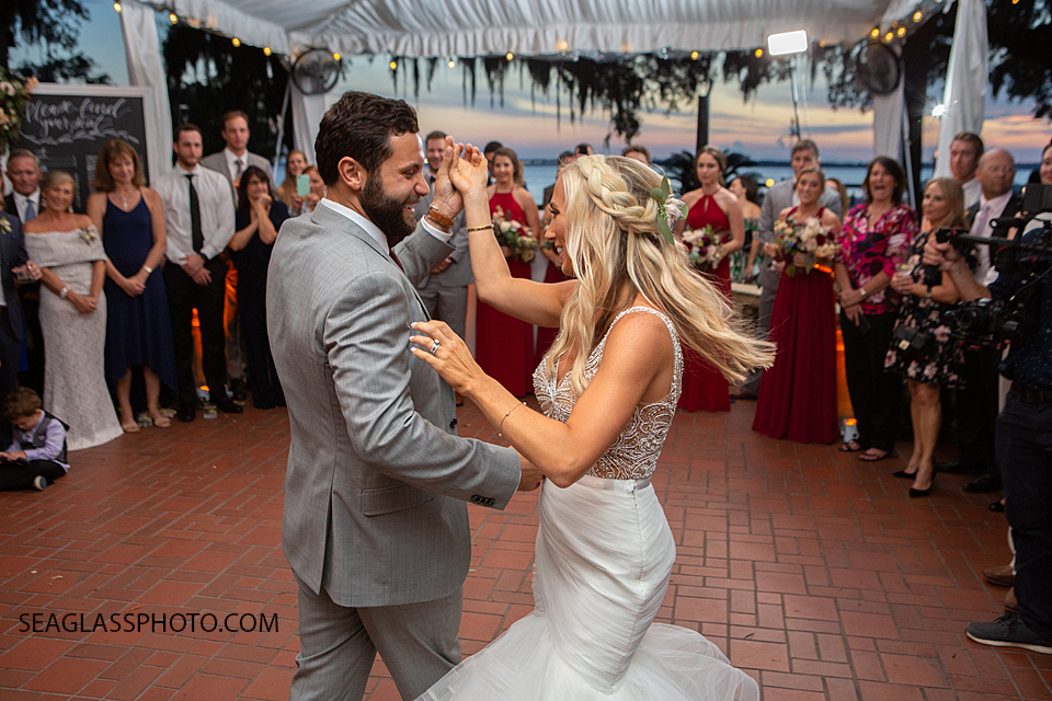 Bride and Groom dance together at the reception photographed by a Vero Beach Photographer