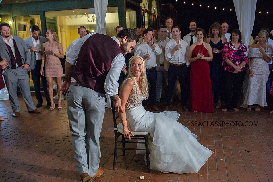 Groom walking around his bride photographed by a Vero Beach Photographer