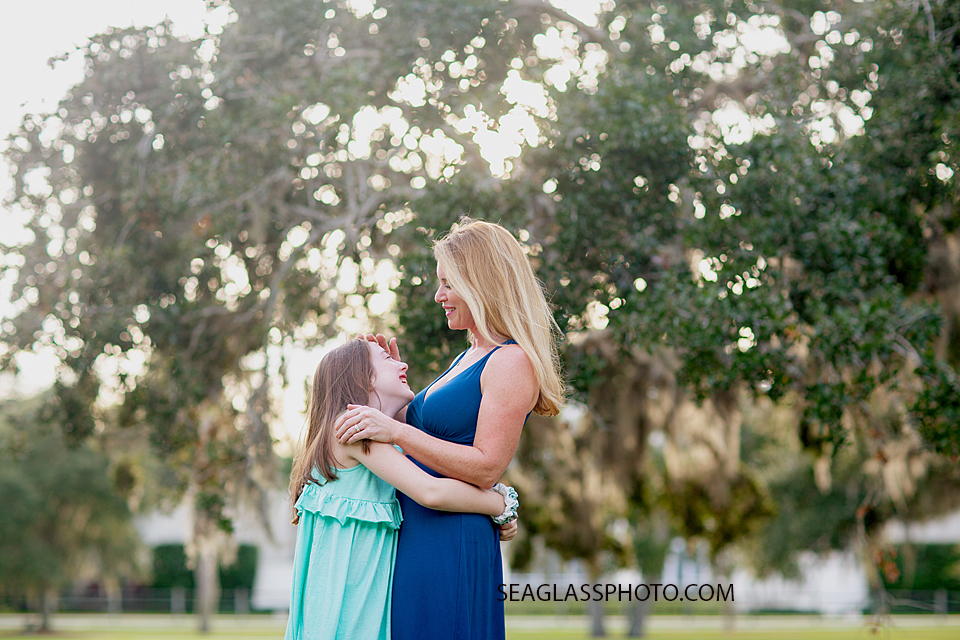 Mother and daughter speding time with each other at Riverside Park in Vero Beach Florida