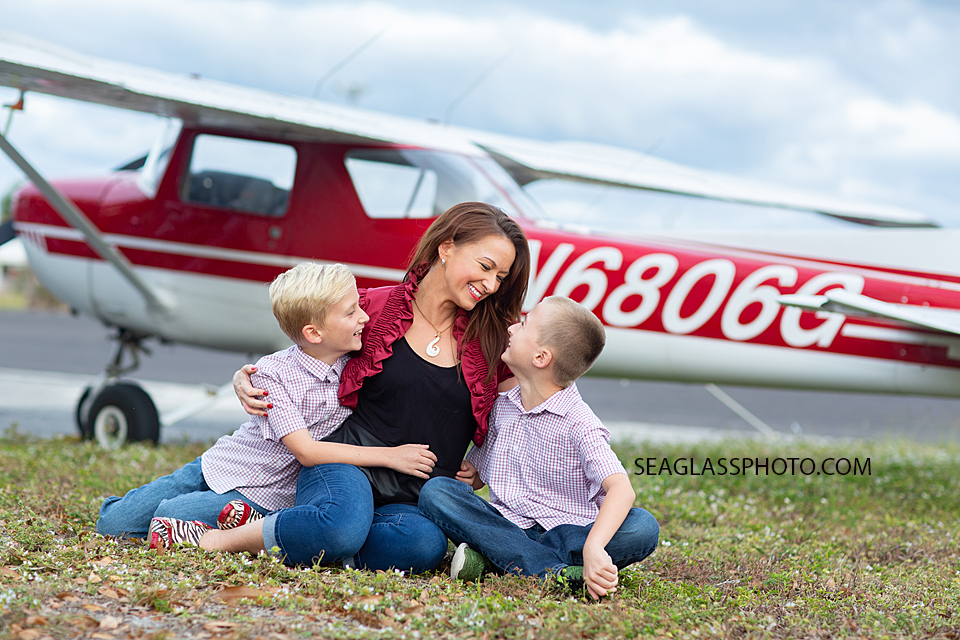 Mother holds her sons close during family photos in Vero Beach Florida