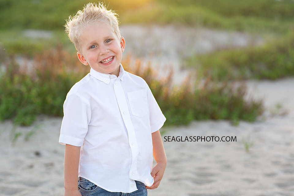 Close up of young boy on the beach during family photos in Vero Beach Florida