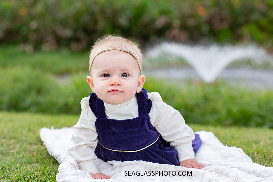 Baby girl looking for her mommy during family photos at the Country Club in Vero Beach Florida