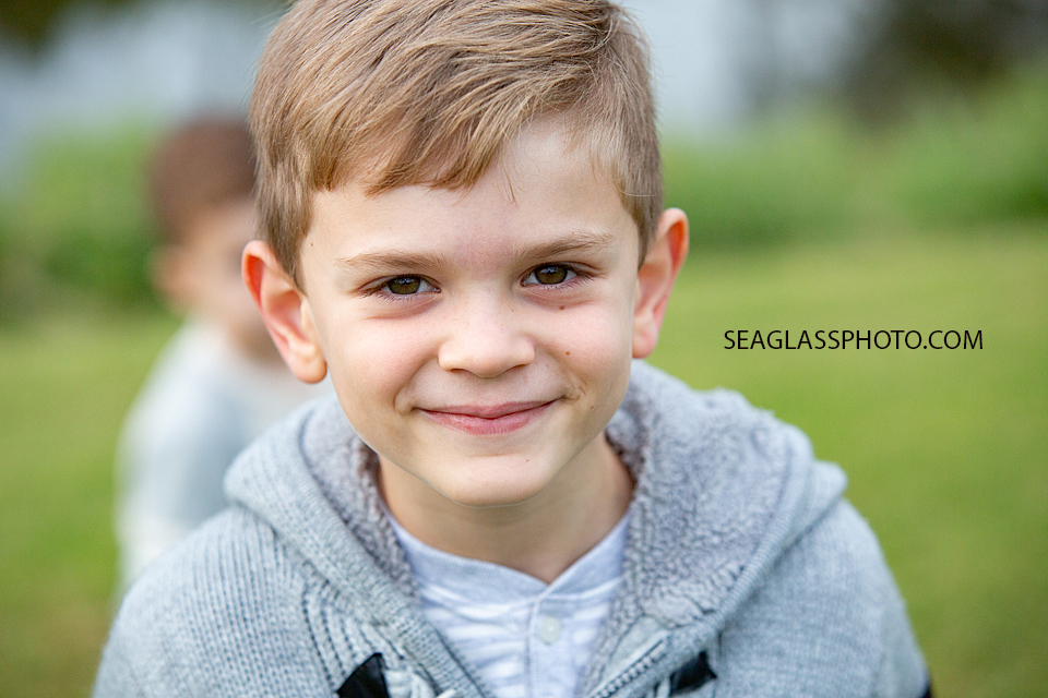 Close up of young boy during family photos at the Country Club in Vero Beach Florida