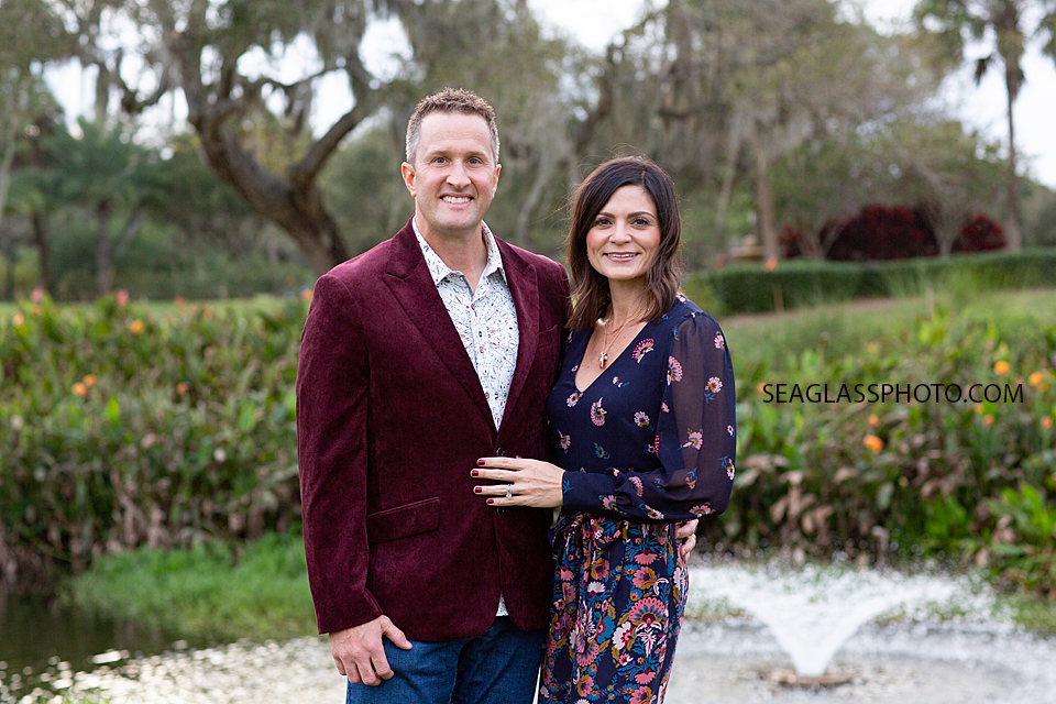 Close up of parents posing for a photo during family photos at the Country Club in Vero Beach Florida
