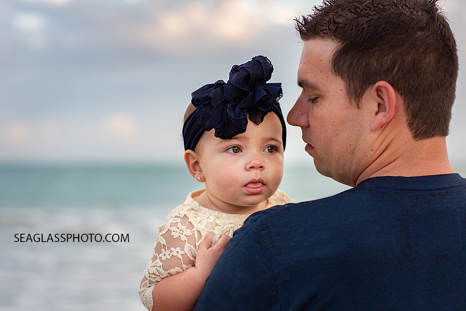 Close up of father and daughter on the beach during their family photoshoot in Vero Beach Florida