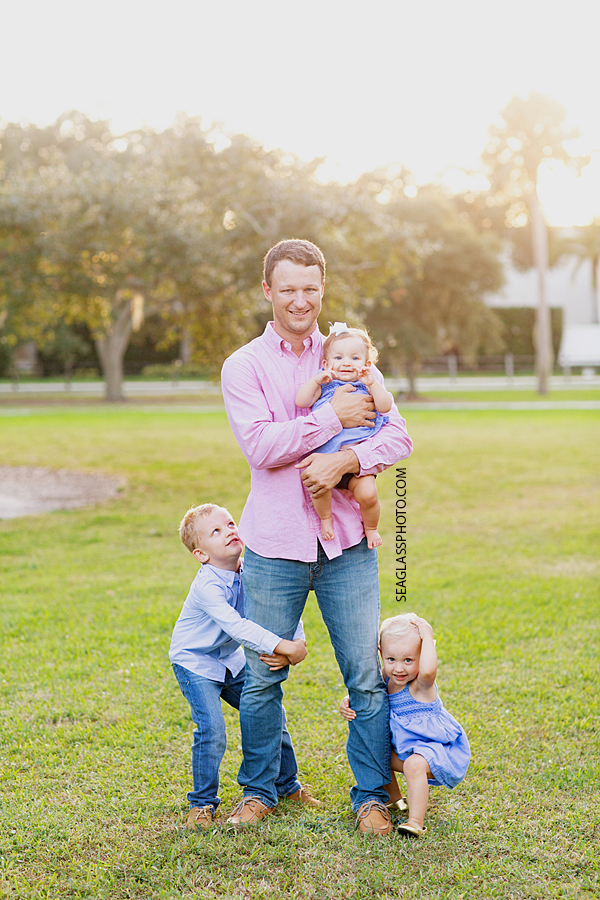 Father with his kids during family photos at Riverside in Vero Beach Florida