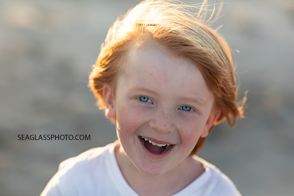 Close up of one very happy young boy during family photoshoot in Vero Beach Florida