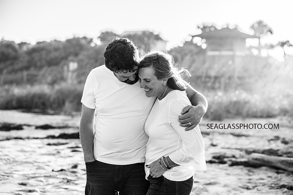 Black and white photo of of husband and wife during family photoshoot in Vero Beach Florida