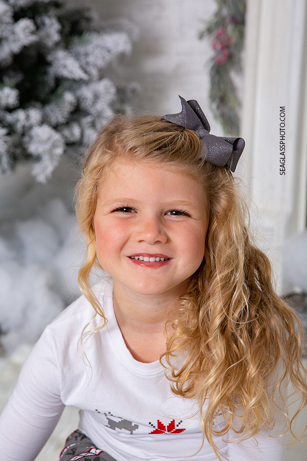 Close up of a little girl during holiday family photos in Vero Beach Florida