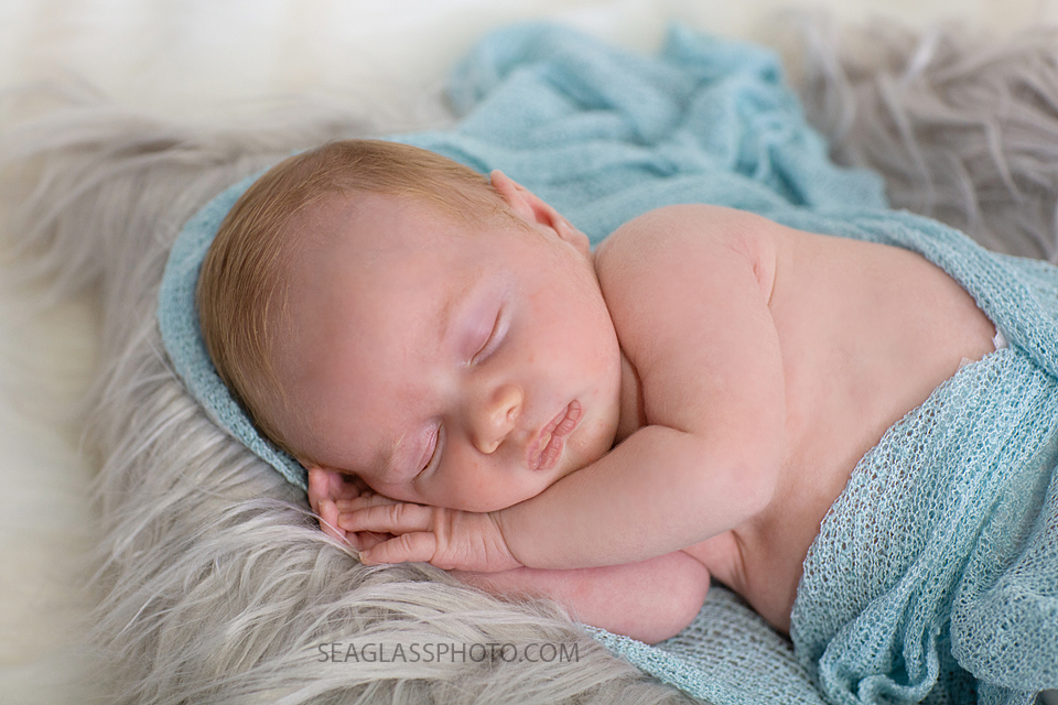 Close up of newborn baby boy sleeping during newborn photoshoot in Vero beach Florida
