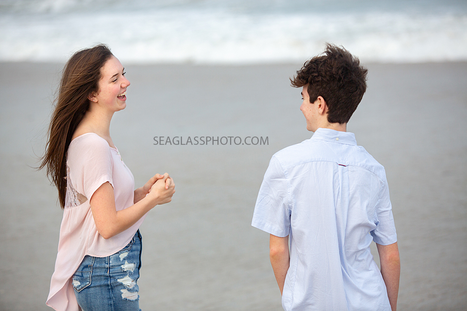 Close up of siblings laughing during family photoshoot on the beach in Vero Beach Florida