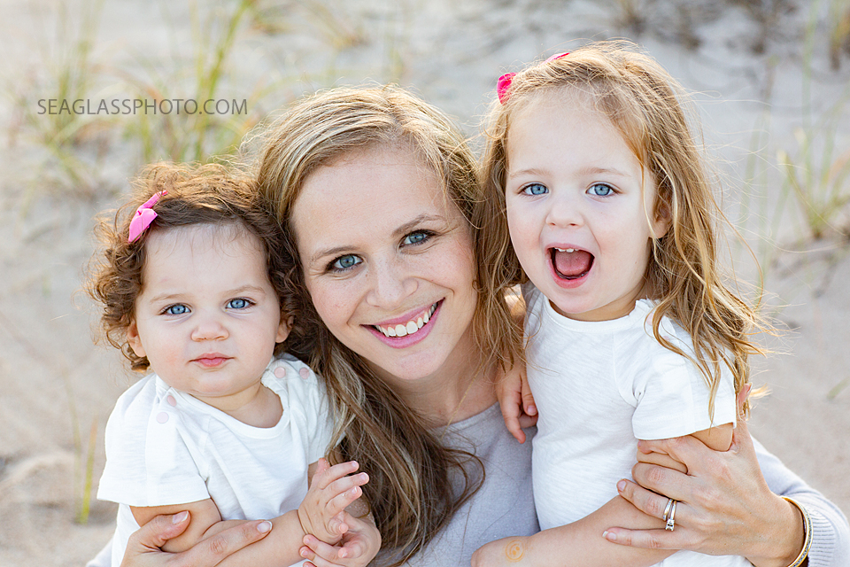 Close up of mom and her two daughters during their family photo shoot in Vero Beach Florida